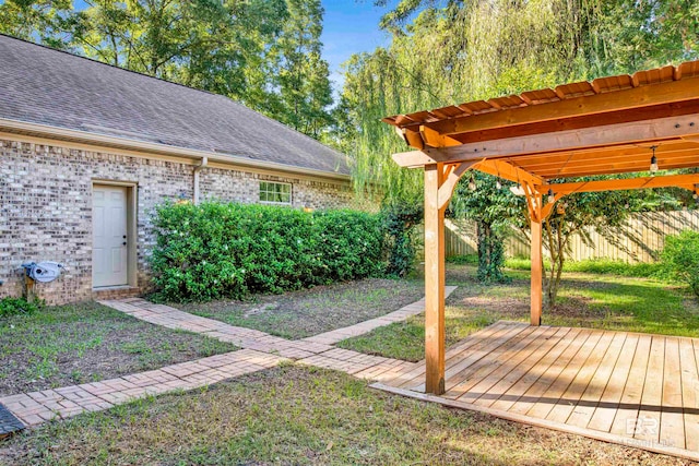 view of yard with a wooden deck