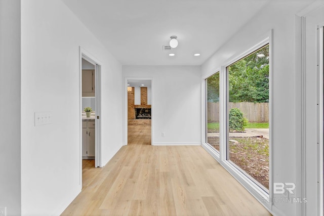 18 Rollins Pl, Atmore, AL 36502 - unfurnished dining area featuring light wood-style flooring and recessed lighting