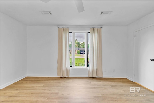 18 Rollins Pl, Atmore, AL 36502 - empty room with a ceiling fan and light wood-type flooring