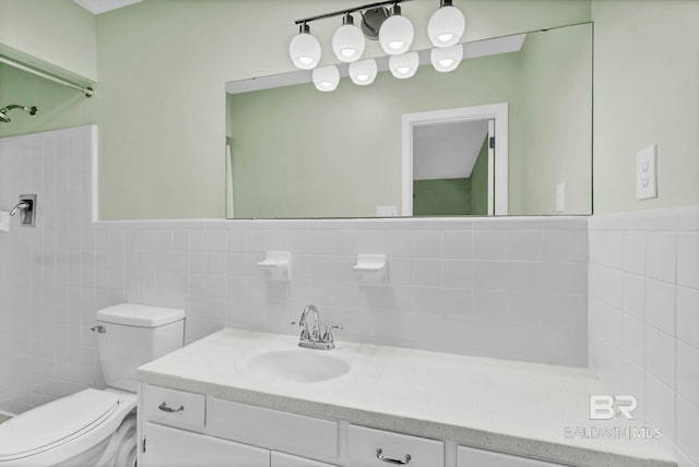 18 Rollins Pl, Atmore, AL 36502 - bathroom with vanity and tile walls