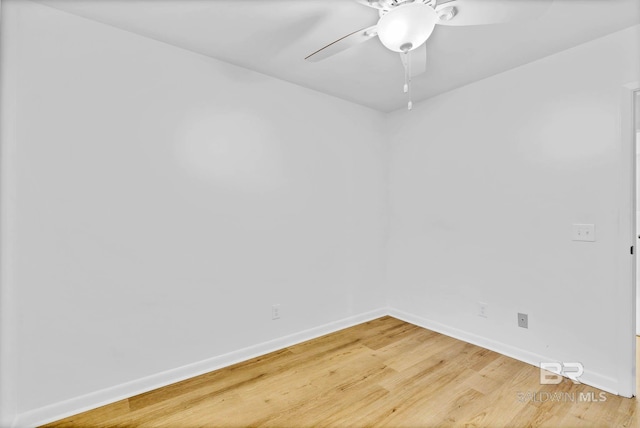18 Rollins Pl, Atmore, AL 36502 - empty room featuring light wood-style flooring and a ceiling fan