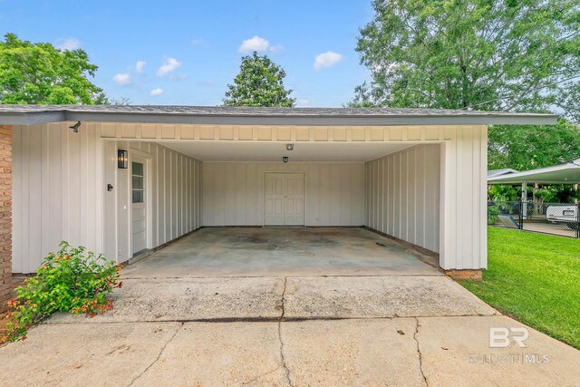 18 Rollins Pl, Atmore, AL 36502 - view of car parking with a carport and driveway
