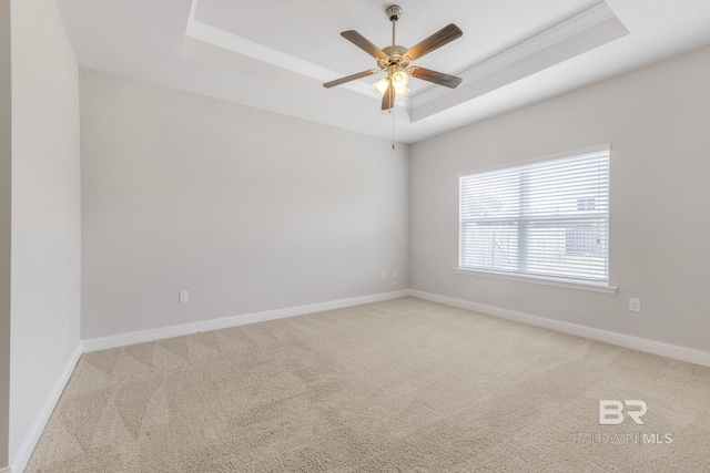31689 Kestrel Loop, Spanish Fort, AL 36527 - carpeted spare room featuring a raised ceiling, a ceiling fan, and baseboards
