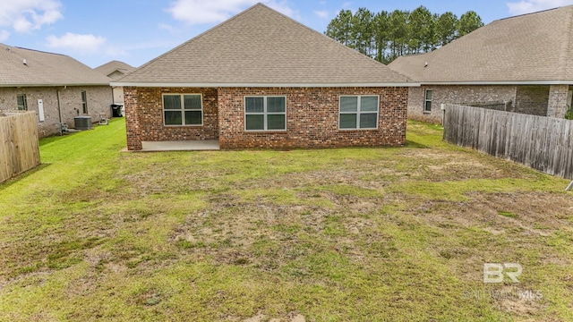 31689 Kestrel Loop, Spanish Fort, AL 36527 - back of property featuring cooling unit, a patio, brick siding, and roof with shingles