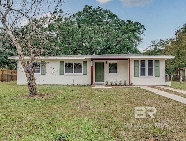 ranch-style house with a front yard