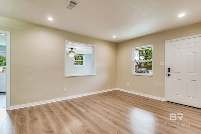 foyer with light wood-type flooring