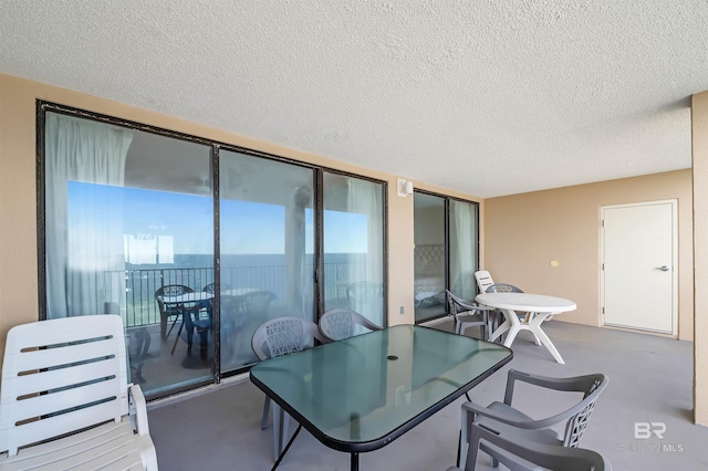 balcony featuring outdoor dining area