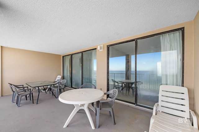 balcony featuring outdoor dining area