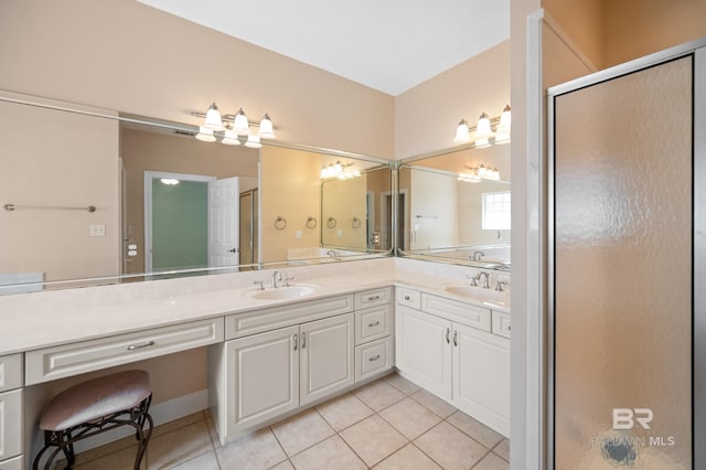 bathroom with vanity, tile patterned flooring, and an enclosed shower