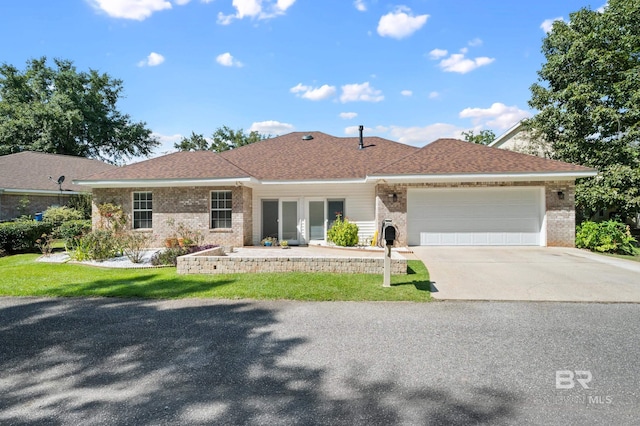 ranch-style home featuring a garage