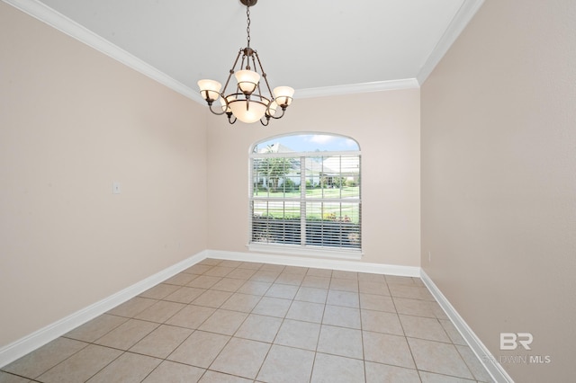 spare room with light tile patterned floors, ornamental molding, and a chandelier