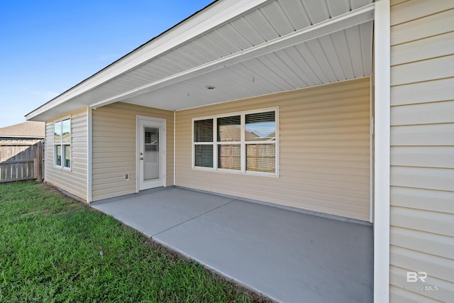 doorway to property with a patio