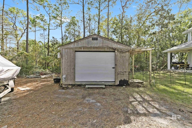 view of outbuilding with a garage