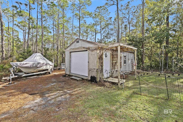 view of outbuilding featuring a garage