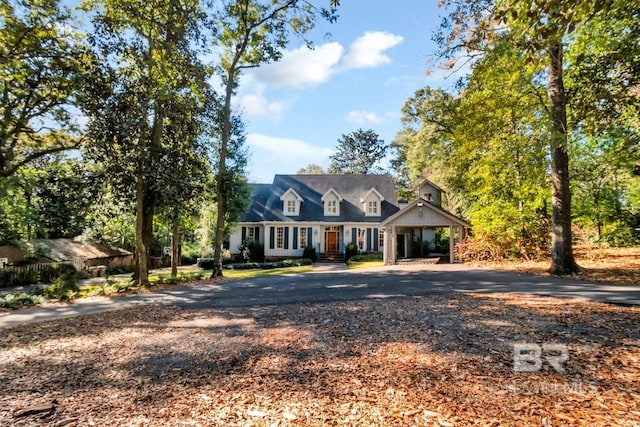 view of new england style home