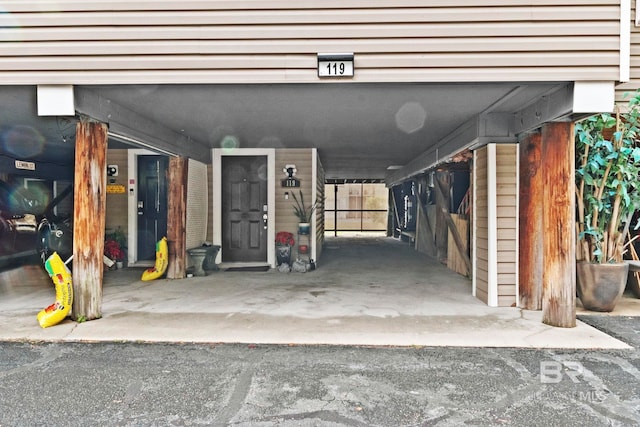 garage with a carport