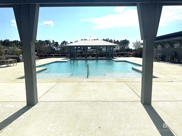 view of pool with a gazebo and a patio area