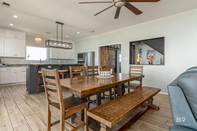 2802 Bienville Blvd, Dauphin Island, AL 36528 - dining room with crown molding, a ceiling fan, visible vents, and recessed lighting