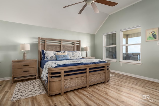 2802 Bienville Blvd, Dauphin Island, AL 36528 - bedroom featuring baseboards, a ceiling fan, lofted ceiling, and wood finished floors