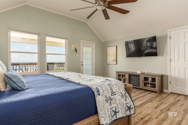 2802 Bienville Blvd, Dauphin Island, AL 36528 - bedroom featuring a ceiling fan, baseboards, light wood-style flooring, and lofted ceiling