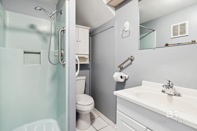 bathroom featuring vanity, walk in shower, toilet, and tile patterned flooring