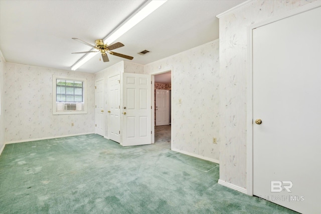 unfurnished bedroom with carpet flooring and ceiling fan