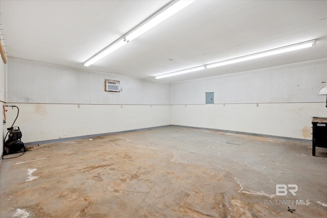 garage with a wall mounted air conditioner