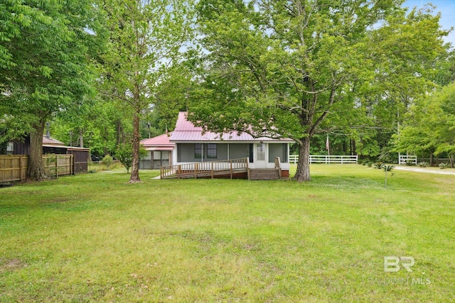 view of yard featuring a deck