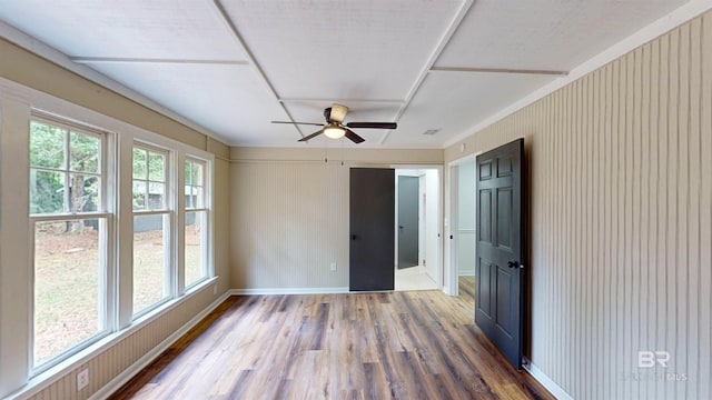 7770 Simmons Dr, Foley, AL 36535 - empty room with wood finished floors, ceiling fan, and baseboards