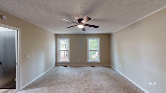 7770 Simmons Dr, Foley, AL 36535 - empty room with a ceiling fan, baseboards, a textured ceiling, and light colored carpet