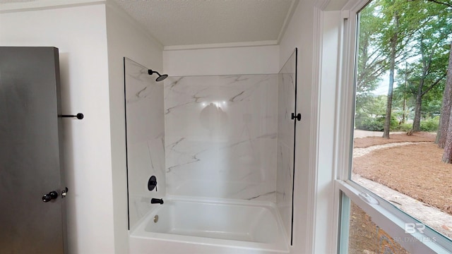 7770 Simmons Dr, Foley, AL 36535 - full bathroom featuring bathing tub / shower combination and a textured ceiling