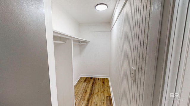 7770 Simmons Dr, Foley, AL 36535 - walk in closet with wood finished floors