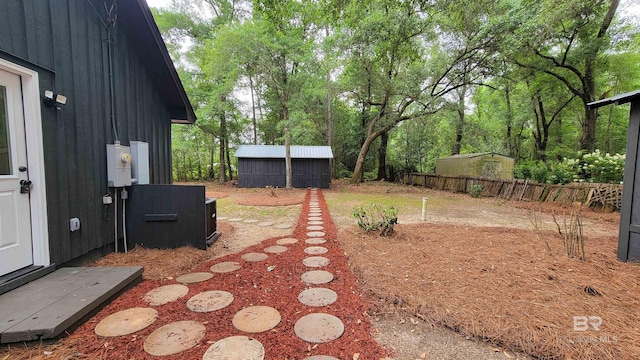 7770 Simmons Dr, Foley, AL 36535 - view of yard featuring fence and an outdoor structure