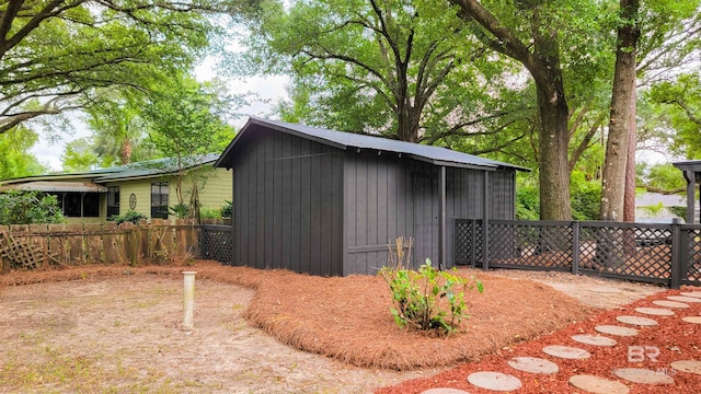 7770 Simmons Dr, Foley, AL 36535 - view of shed with fence