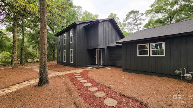 7770 Simmons Dr, Foley, AL 36535 - view of front of property featuring a shingled roof and board and batten siding