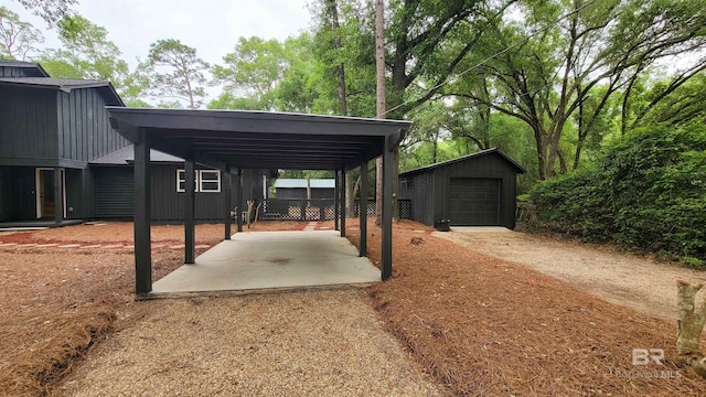 7770 Simmons Dr, Foley, AL 36535 - view of yard featuring an outdoor structure, dirt driveway, and a garage