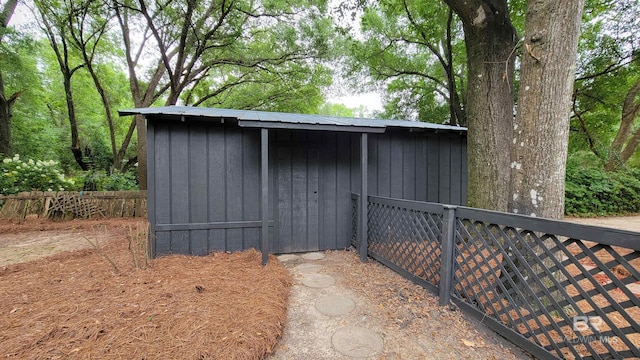 7770 Simmons Dr, Foley, AL 36535 - view of shed featuring fence