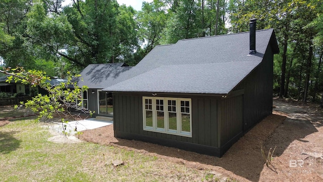 7770 Simmons Dr, Foley, AL 36535 - view of side of property featuring roof with shingles