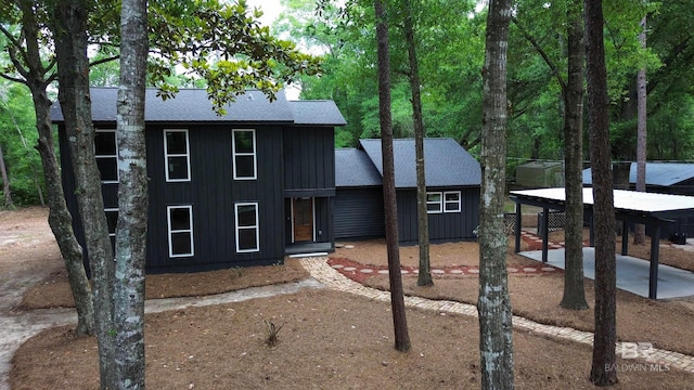7770 Simmons Dr, Foley, AL 36535 - view of front of property featuring roof with shingles and board and batten siding
