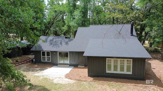 7770 Simmons Dr, Foley, AL 36535 - view of front of house featuring a shingled roof and board and batten siding