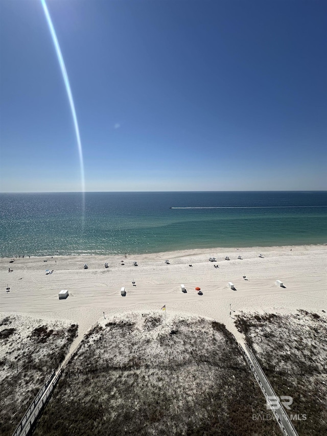 view of water feature with a beach view