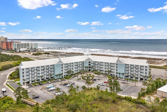 bird's eye view with a water view and a view of the beach