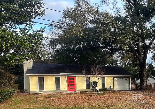 view of front of home with a garage