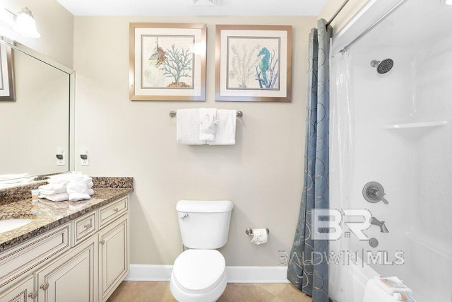 bathroom with baseboards, toilet, shower / tub combo, tile patterned floors, and vanity