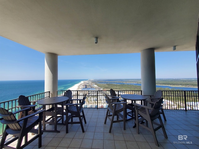 view of patio / terrace with a water view