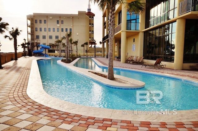 pool with a patio