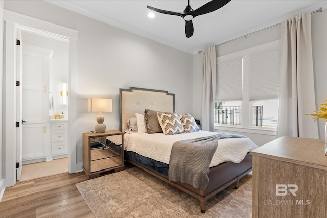 bedroom with ceiling fan, light wood-style flooring, recessed lighting, and ornamental molding