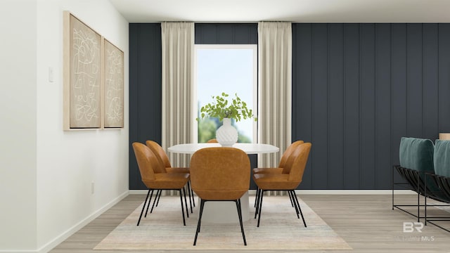 dining space featuring light wood-type flooring