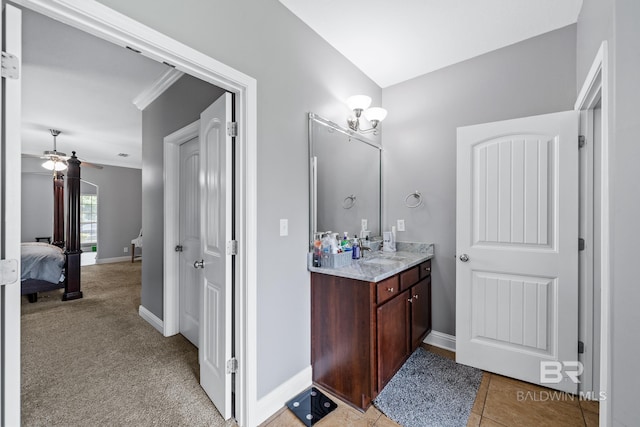 bathroom featuring vanity and ceiling fan