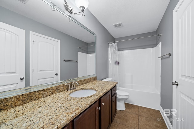 full bathroom with shower / tub combo with curtain, tile patterned flooring, vanity, toilet, and a textured ceiling